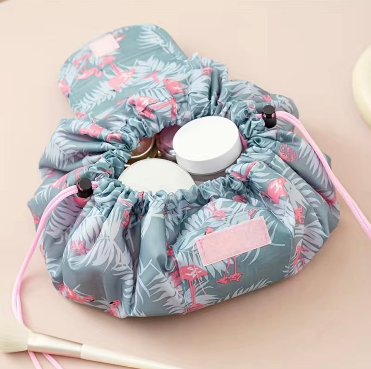 This viral  drawstring make-up bag is a traveler's dream